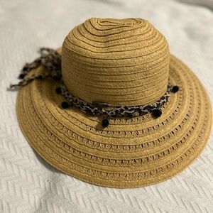 Scala wide brim womans sun hat with beaded leapord print band